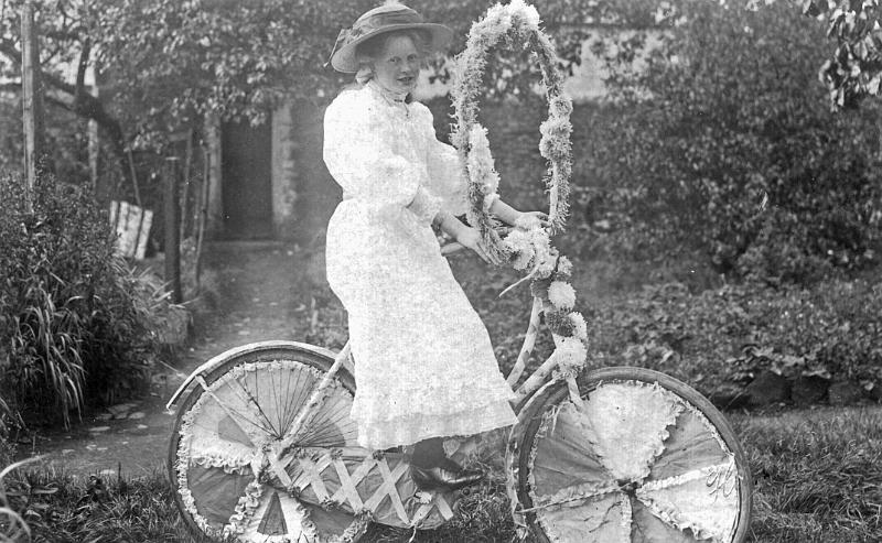Dorothy May Wilson, decorated bike, Anvil House garden.jpg - Dorothy May Wilson, decorated bike, Anvil House garden.